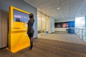 A Woman Using a Multi-Touch Kiosk