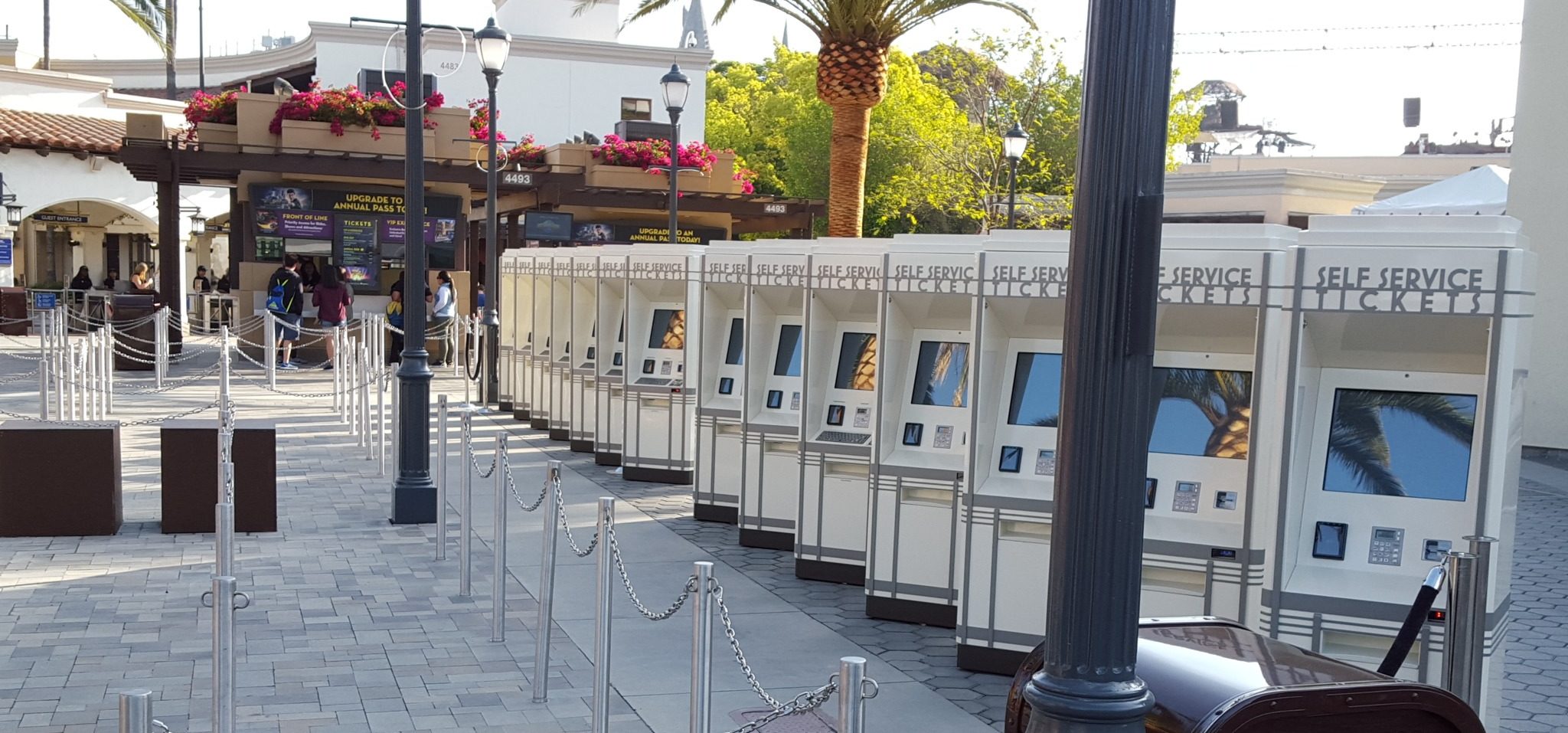 Olea Ticketing Kiosks in a line outside of a Movie Theater