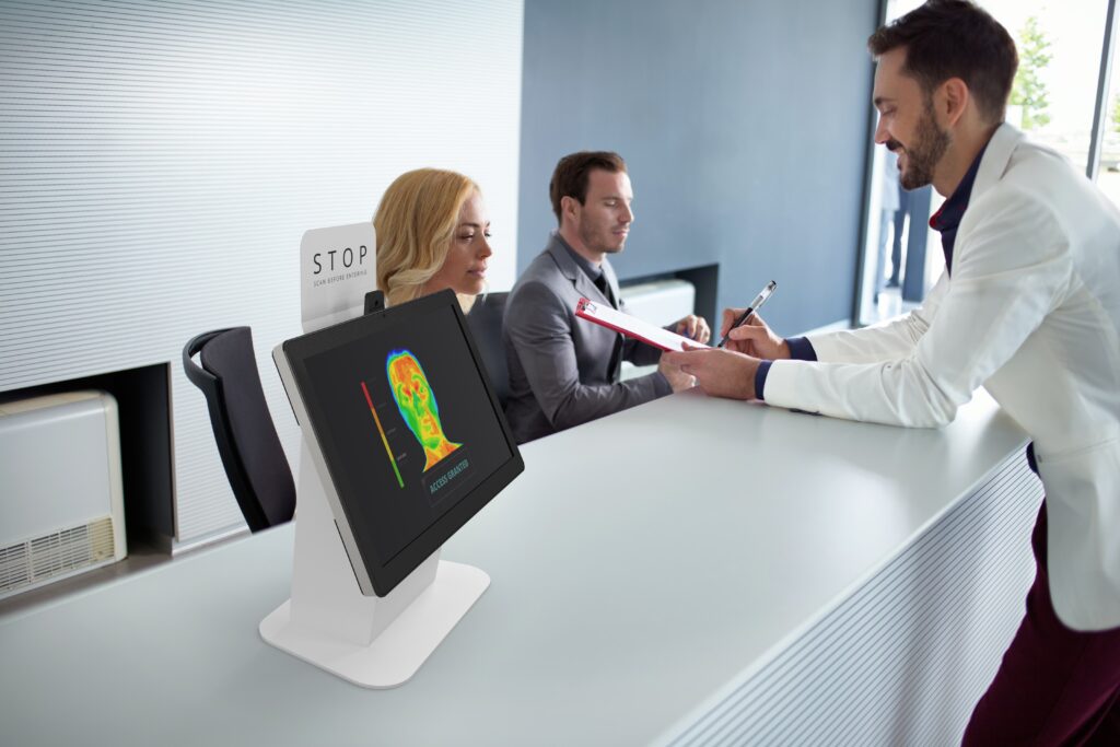 Irvine Desktop LS Thermal Temperature Screening Kiosk in the reception area of a medical office