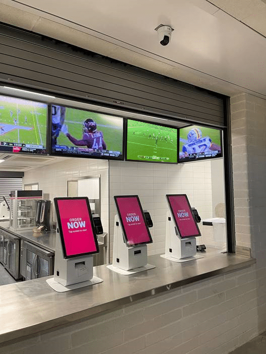 Three QSR kiosks in a restaurant